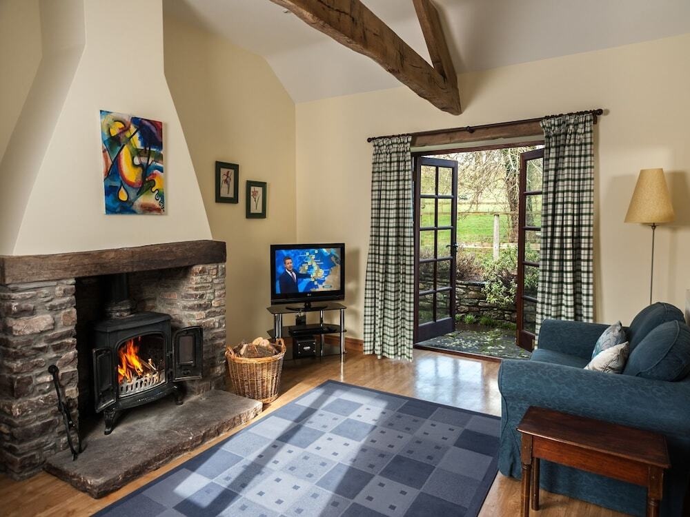Cottage With Folding-Doors In A Calm Environment Surrounded By Farming Fields