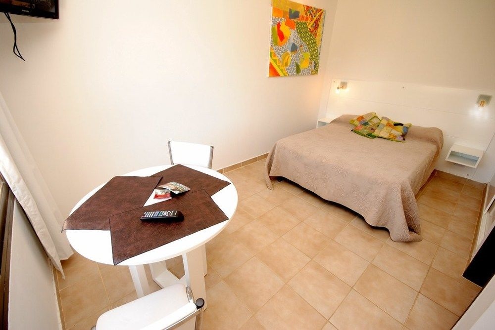 Aguaribay Apart Cabañas