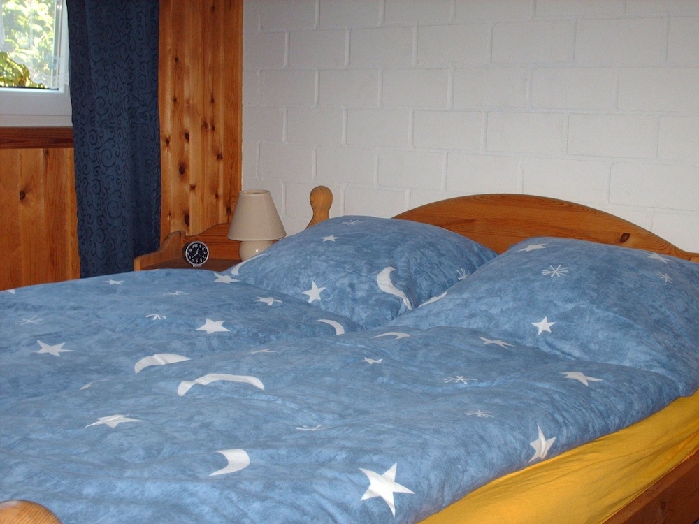 Wooden holiday home in Scandinavian style with a sauna