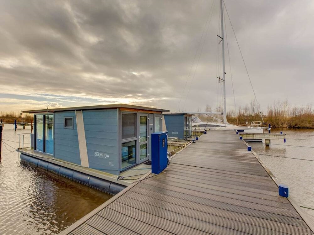 Modern Houseboat In Marina Of Volendam