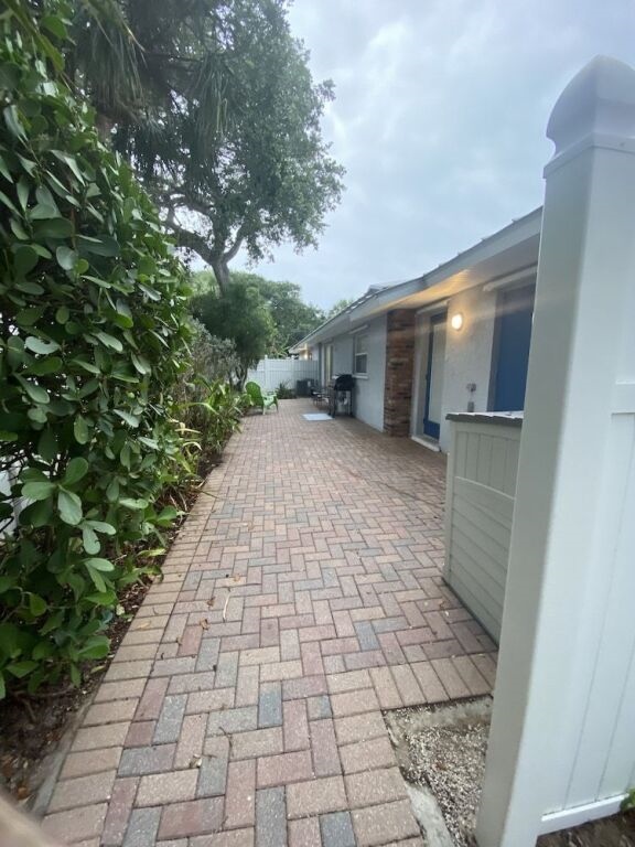 Tropical Theme Home Steps From The Beach