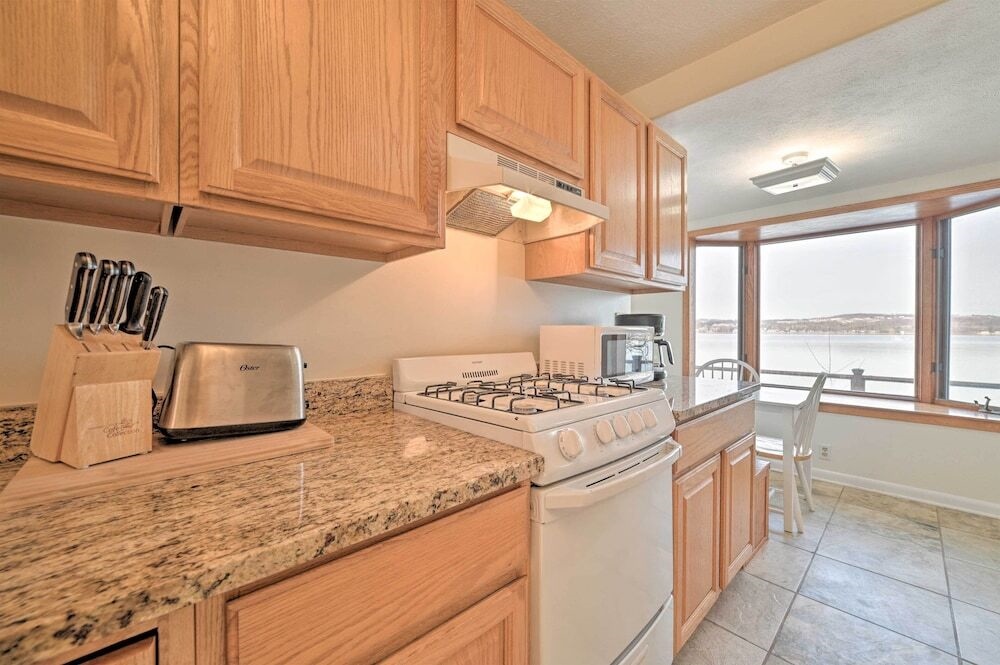 Waterfront Suttons Bay Cottage W/ Fire Pit!