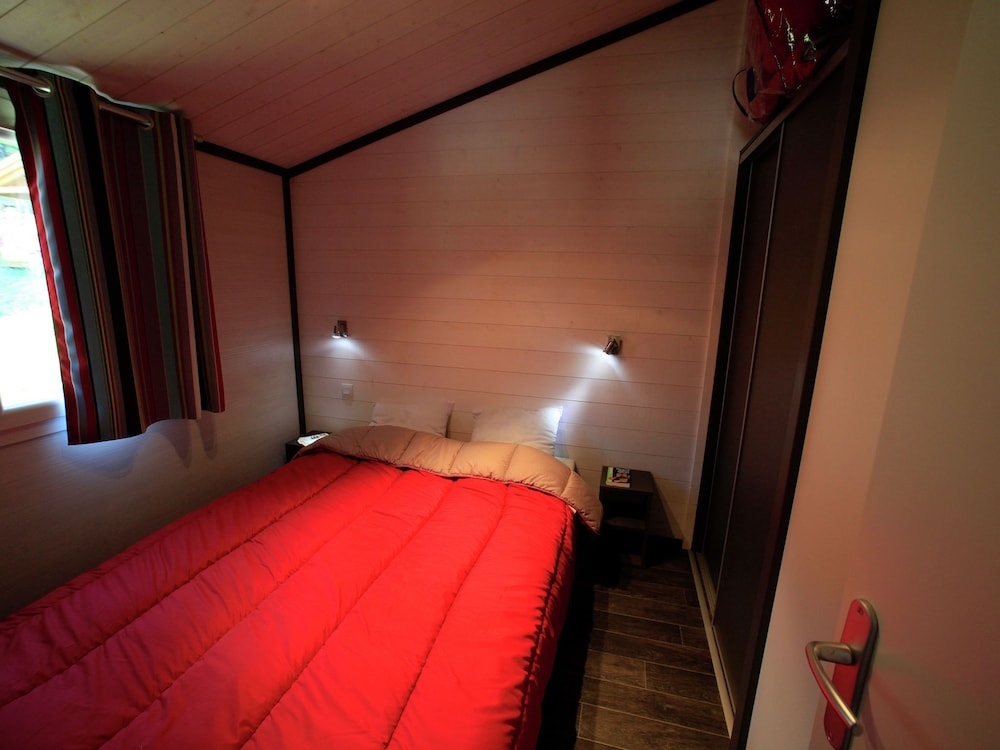 Comfortable Chalet With A Covered Terrace, On A Slope