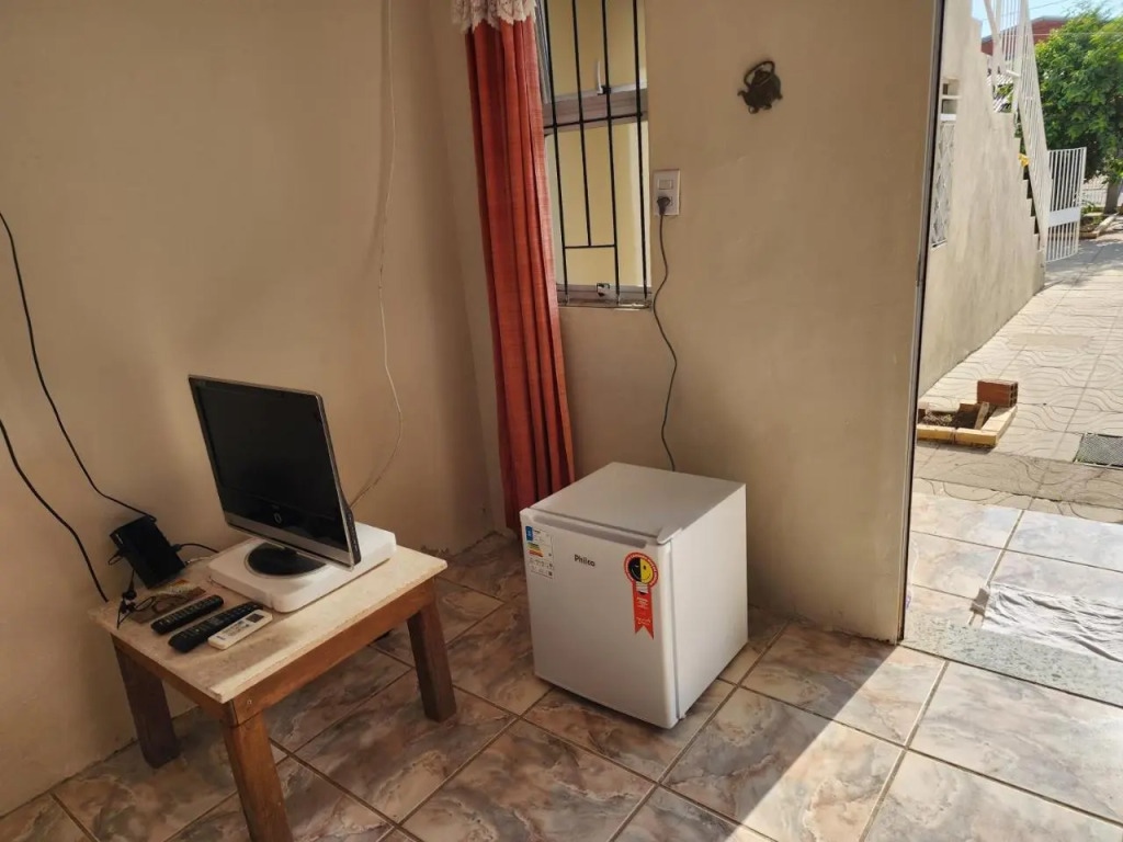 Kitnet casal e apartamento com lareira e vista jardim