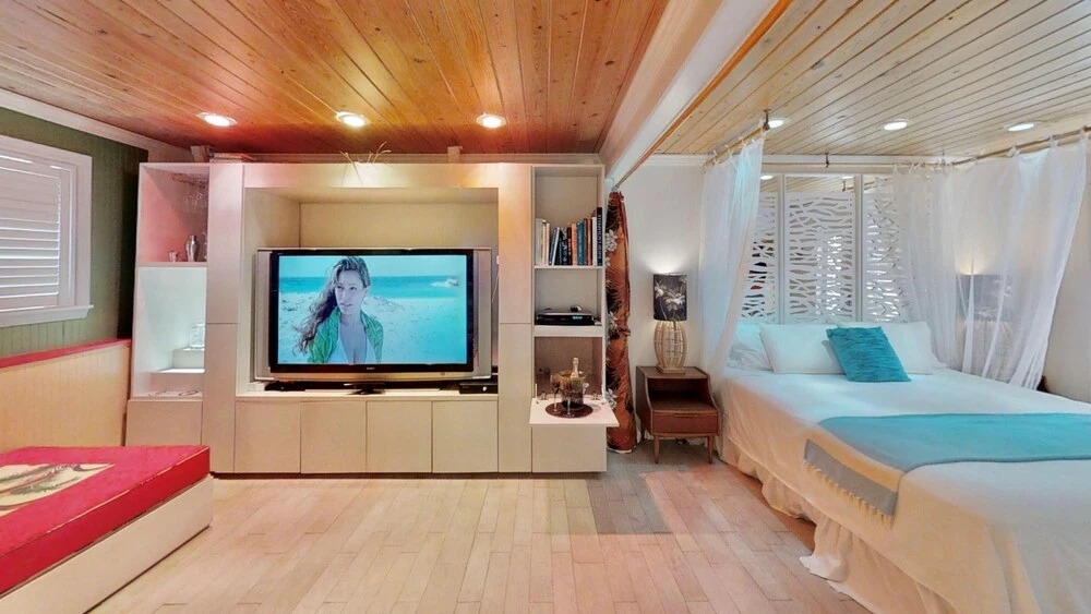 Tropical Beach Bungalow by Teeming Vacation Rentals