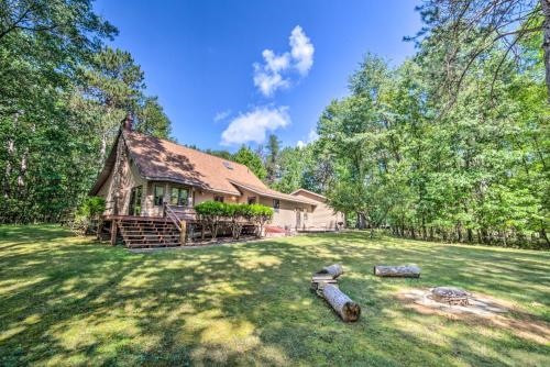 Riverfront Oconto Cabin w/ Fire Pit & Yard!