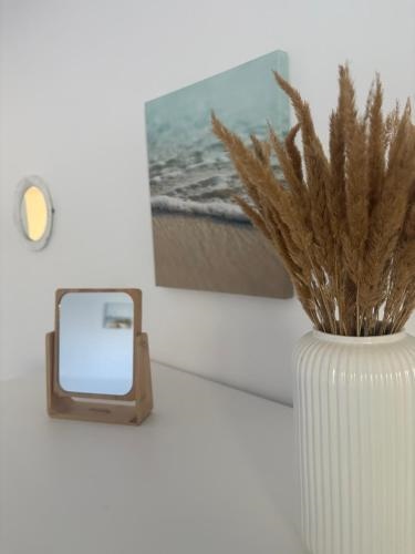 Strandlacheln Lodge - Ferienwohnung mit 2 Schlafzimmern