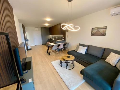 NEW apartment with free garage parking near the airport