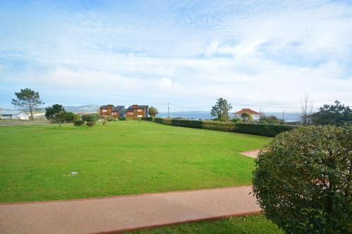 Apartamento con jardin en Playa de Corrubedo