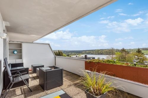 Flexi Home - Balkon , Seeblick, Pool & Speed Wlan