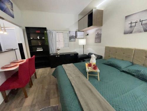 Confortavel Tiny house1, em Nova Iguacu, ar, wi-fi, 400m da UNIG