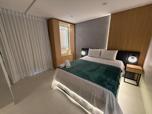 Apartamento com suite e varanda no centro