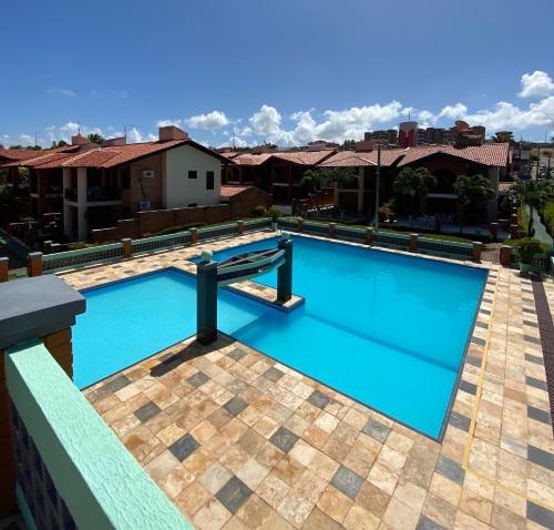 Linda casa Porto das Dunas: 4 suites, churrasqueira e piscina