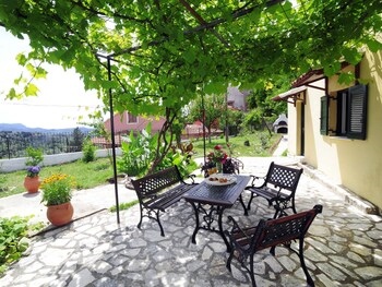 Traditional Cottage On The Hillside Of Antiperni